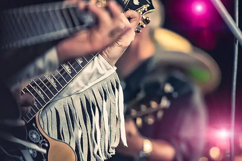 People playing Guitars