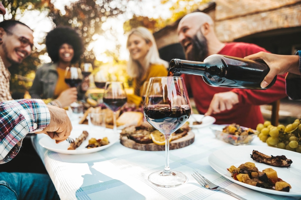 Places to eat in Nashville, best restaurants in Nashville, group of friends enjoying BBQ