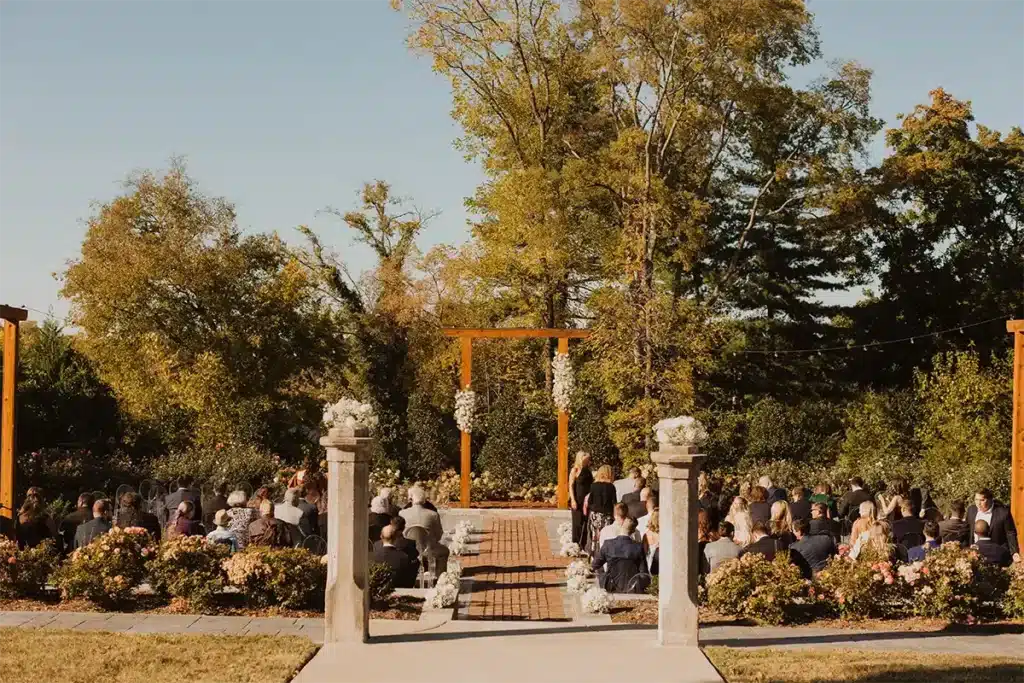 Wedding Ceremony in the Rose Garden at Belle Air Mansion